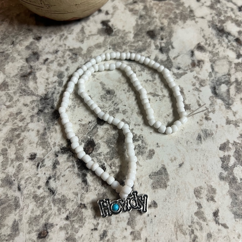 Handcrafted White Beaded Howdy Necklace Charm.